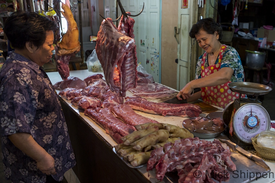 Butcher in a Bangkok fresh market