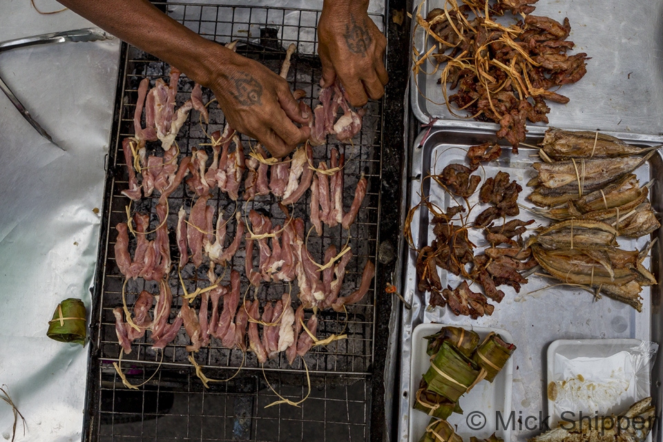 Drying pork over warm coals