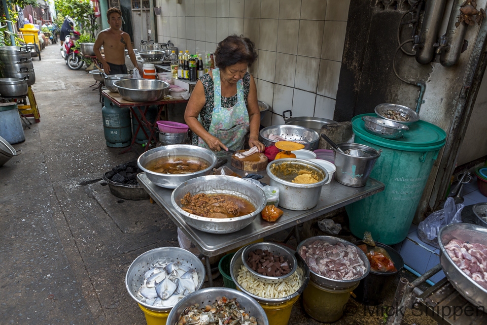 Street kitchen preparing curries to sell in the market