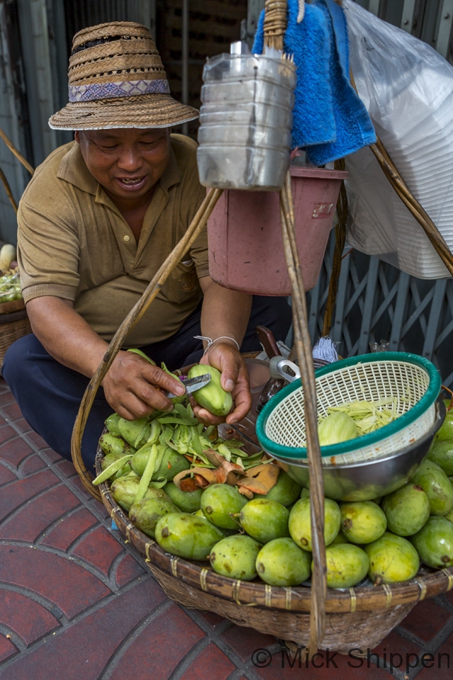 Selling mango in the street, Chinatown, Bangkok, Thailand