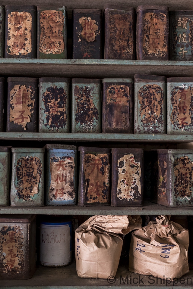 Tins on a shelive in an old shophouse Nakhon Phanom, Thailand