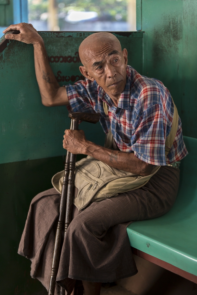 Man on a train, Yangon, Myanmar.