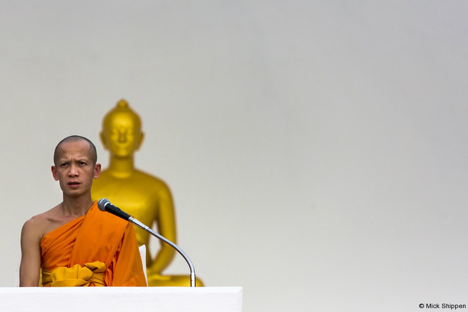 Buddhist monk and Buddha image
