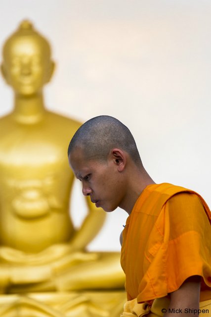 Buddhist monk and Buddha image