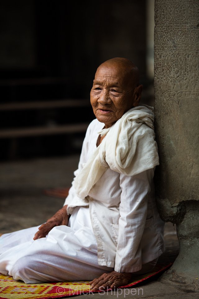 Buddhist nun at Angkor Wat, Siem Reap, Cambodia.