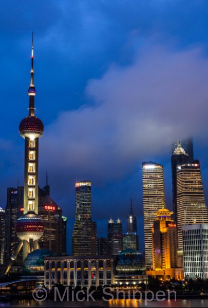 Shanghai's Pudong business district on east bank of the Huangpu River, viewed from the Bund on the otherside.