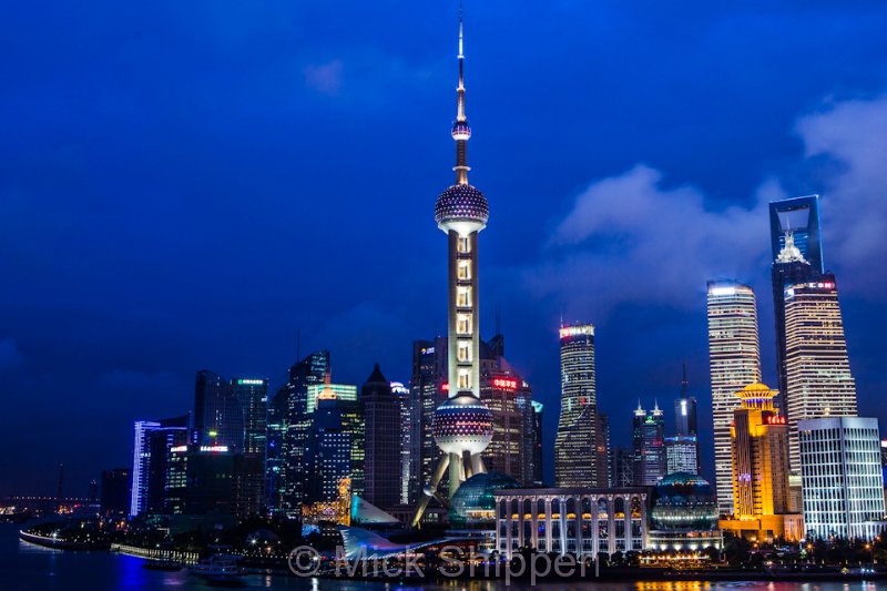 Shanghai's Pudong business district on east bank of the Huangpu River, viewed from The Bund on the otherside.