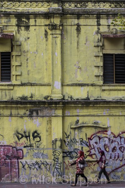A graffiti covered wall in the centre of Kuala Lumpur