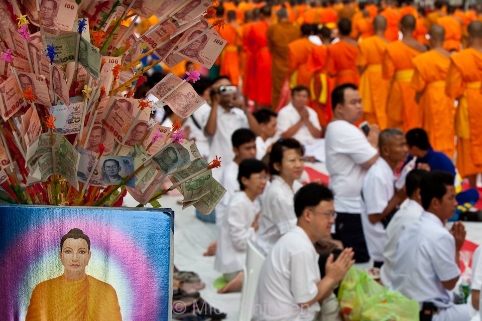 Alms giving for 30,000 Buddhist monks in central Bangkok