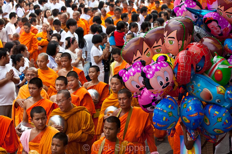 Alms giving for 30,000 Buddhist monks in central Bangkok