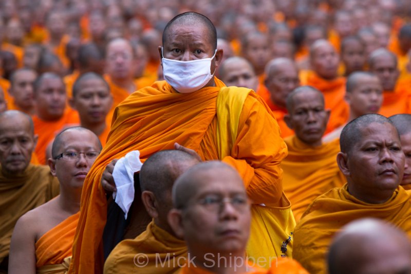 Alms giving for 12,000 Buddhist monks in central Bangkok