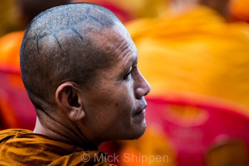 Alms giving for 12,000 Buddhist monks in central Bangkok