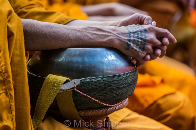 Alms giving for 12,000 Buddhist monks in central Bangkok